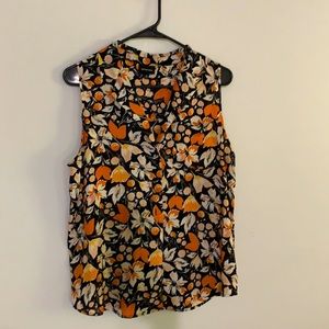 Orange on black floral print blouse. Easy-breezy.